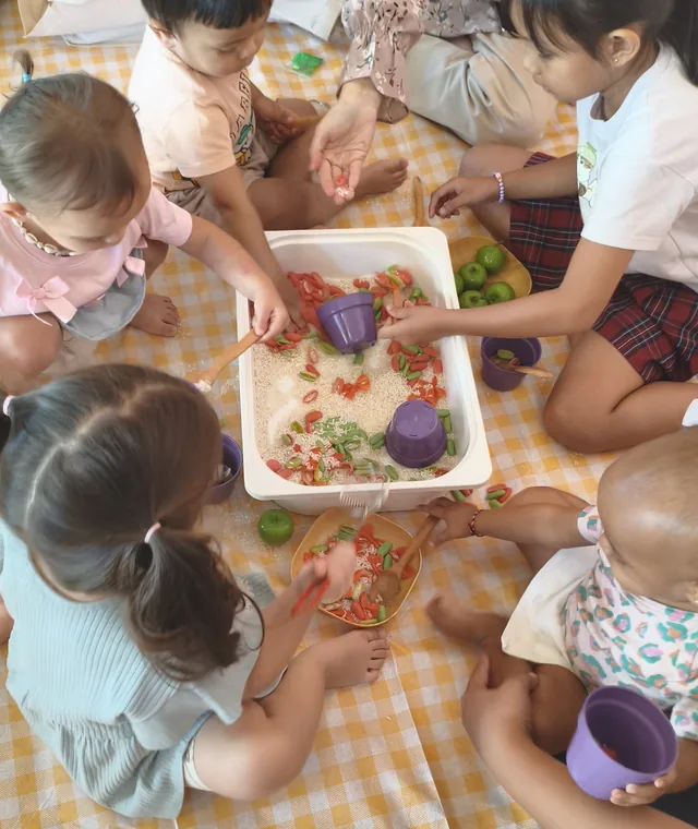Reaching in together at PLEY